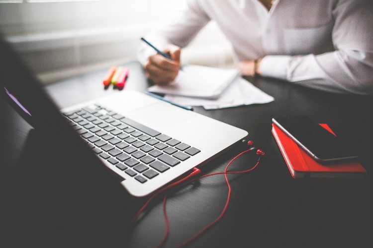 entrepreneur-working-on-his-macbook-picjumbo-com-2